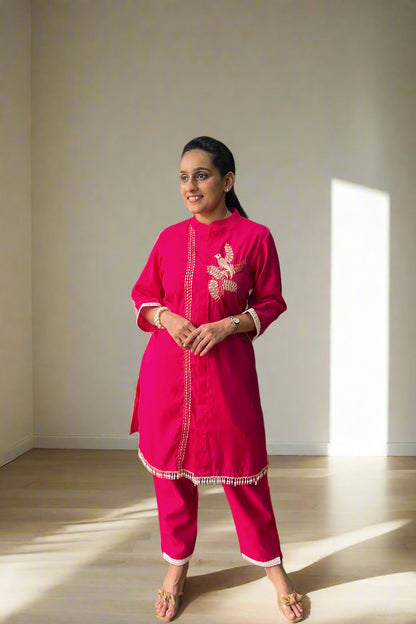 Radiant embroidered kurti with pants.