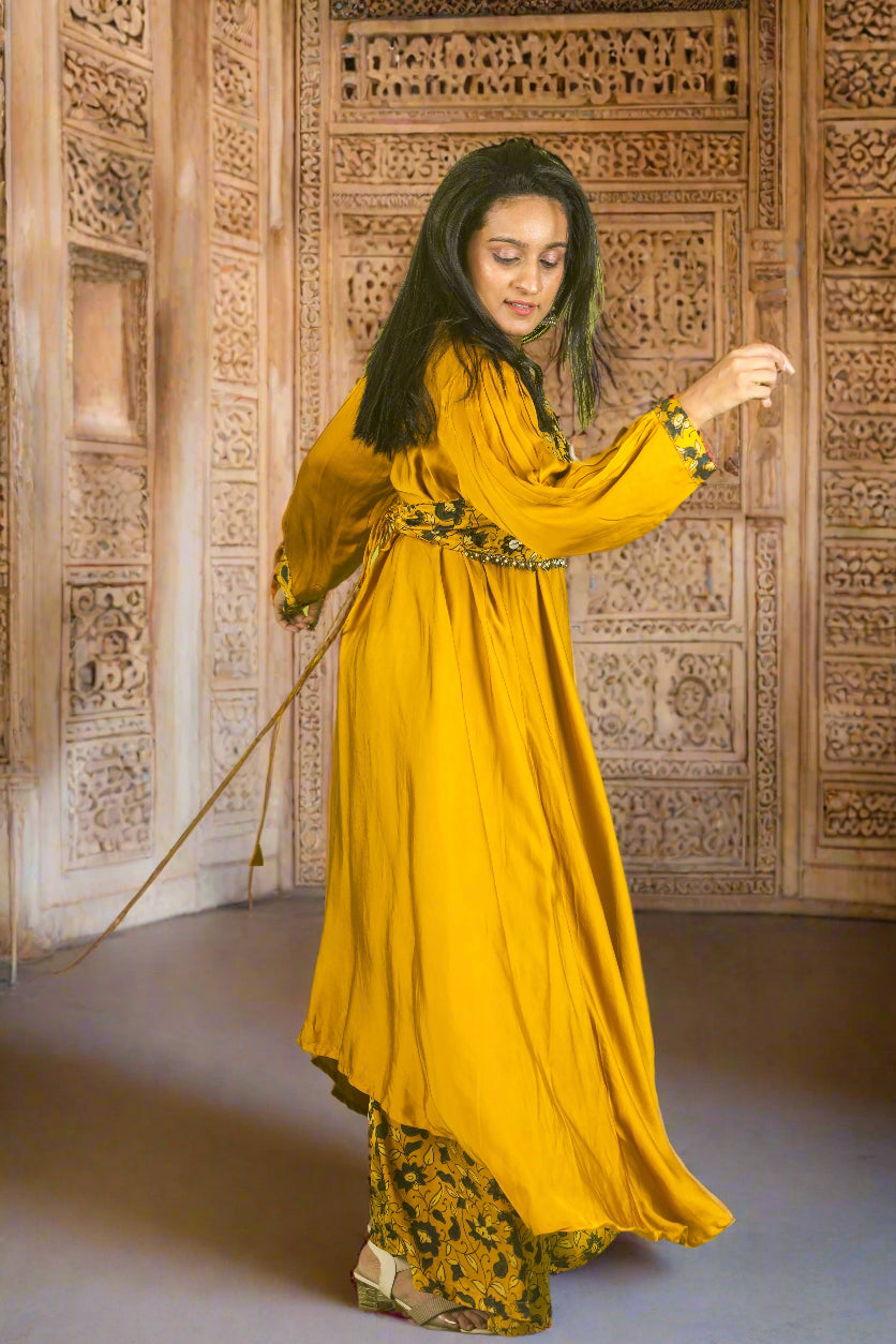 Yellow ajrakh kodi luxe kurti with hand embroidered blouse.