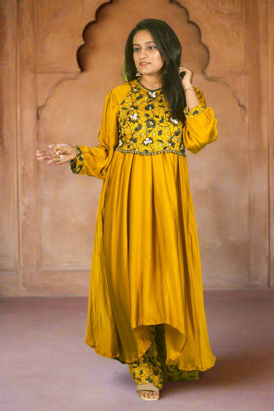 Yellow ajrakh kodi luxe kurti with hand embroidered blouse.