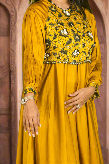 Yellow ajrakh kodi luxe kurti with hand embroidered blouse.