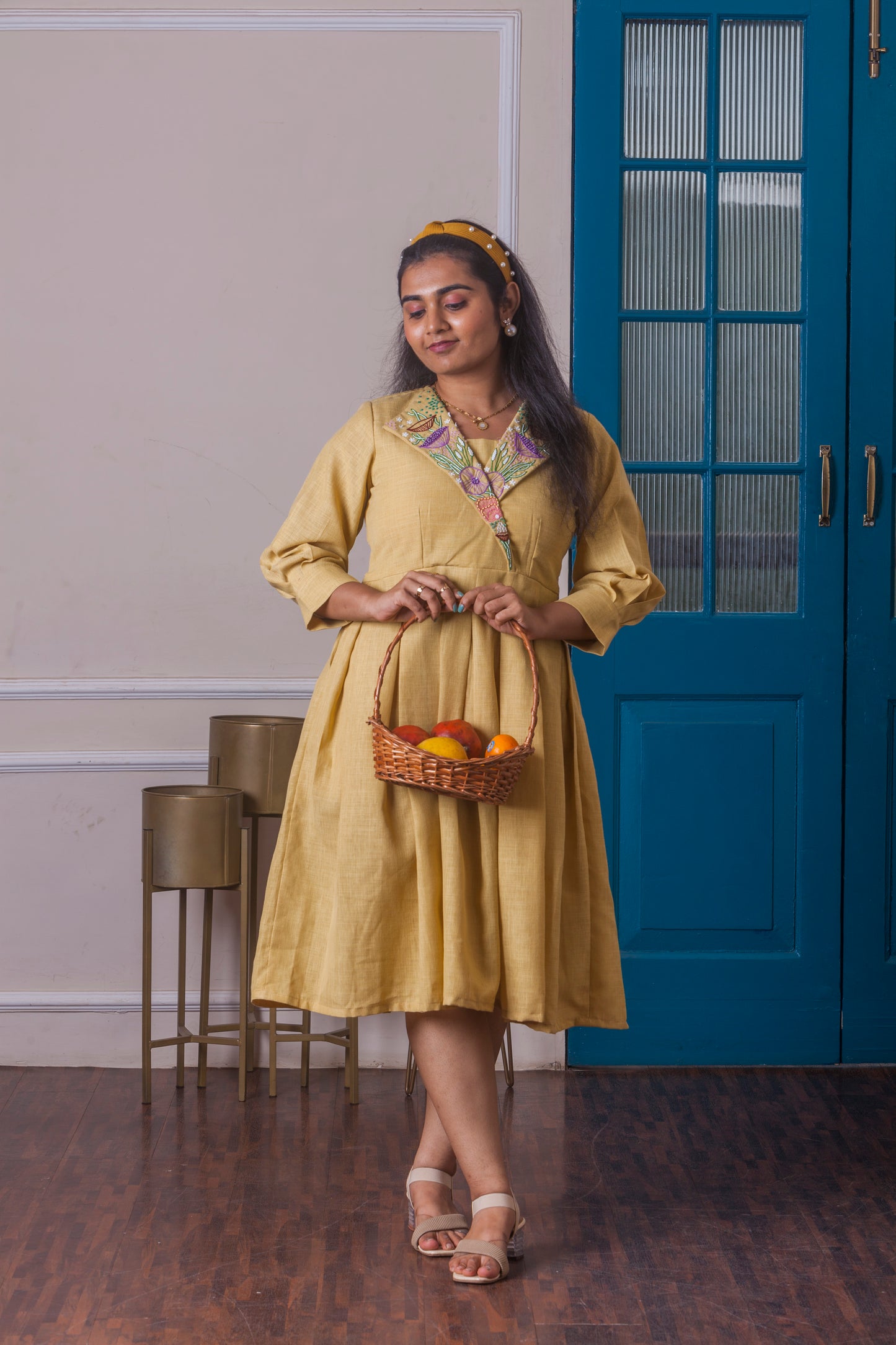 Yellow box pleated dress with hand embroidered collar