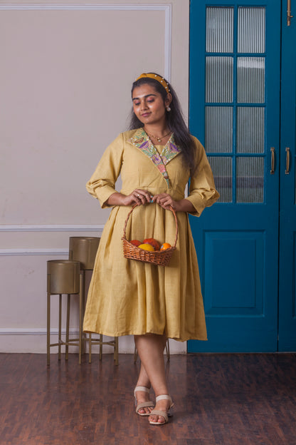 Yellow box pleated dress with hand embroidered collar