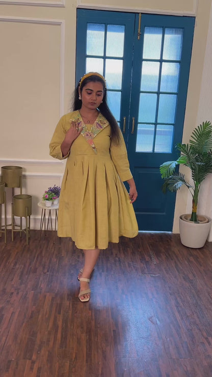 Yellow box pleated dress with hand embroidered collar